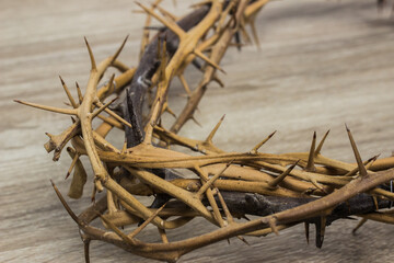 Fototapeta premium A thorn crown on a wooden table. 