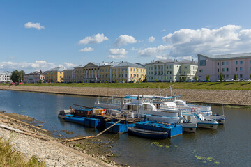 Naklejka premium View on the river bank in Vologda. Boats in foreground. 