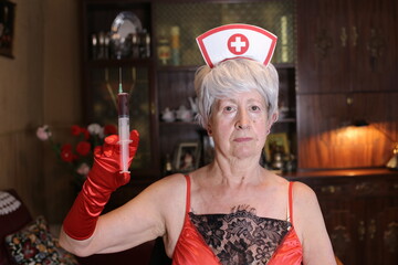 Senior woman dressed as a nurse for Halloween