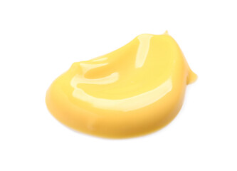 Smear of delicious melted cheese isolated on white