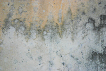 Grungy cracked and lightly stained texture of an old grey marble slab