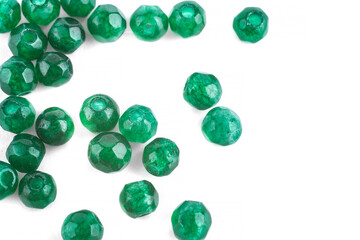 Beads made of natural green agate on a white background are isolated