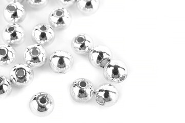 Beads made of natural hematite on a white background are isolated