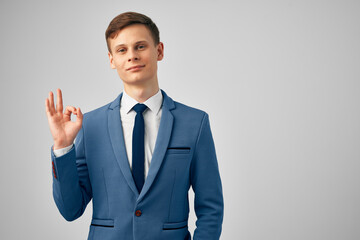 business man in a suit gesturing with his hands office professional work