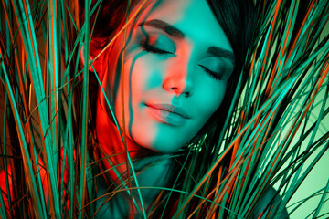 Photo of inspired lovely cute lady close eyes enjoy exotic journey abroad isolated green neon light...