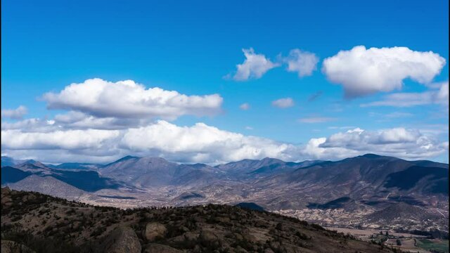time lapse of clouds in motion over hills in Valle de Elqui, Chile