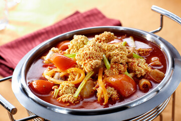 Delicious Chinese cuisine, stewed fish and eggs in tomato sauce
