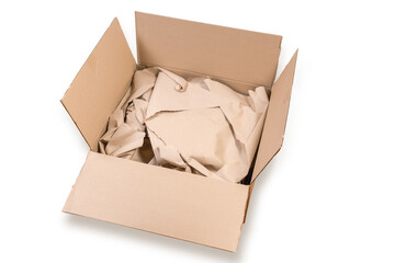 Open gray brown corrugated packing box with wrapping paper inside