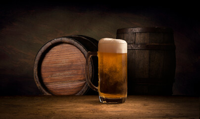 Old wooden barrel on a brown background