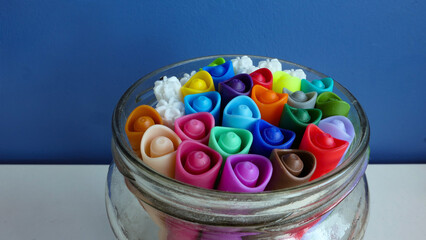 colorful markers in a jar