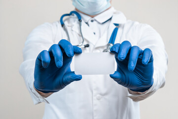 doctor's hands in blue gloves close-up, medicine, examination