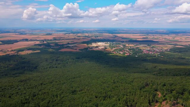 Drone flight over mountain village with forests. Sleza mountain near Wroclaw in Poland. Nature background, aerial view