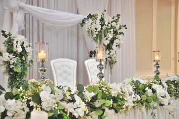 Fototapeta na wymiar Candles on a table setting for wedding reception