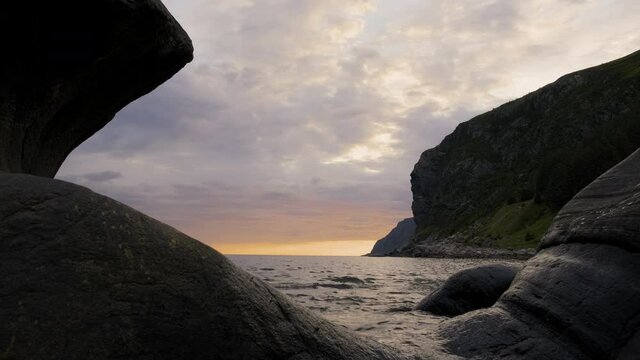 Famous Tourist Attraction Of Kannesteinen Rock In Rural Village Of Oppedal, Norway. wide shot