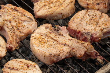 Roast pork entrecote on the grill.