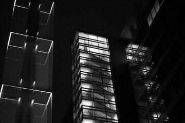 high rise glass building urban dark building