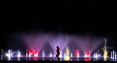 Fototapeta na wymiar Night fountain with lights