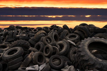 Landfill with old tires and tyres for recycling. Reuse of the waste rubber tyres. Disposal of waste...