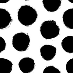 Geometric abstract seamless pattern with black circles. Modern black and white vector texture. Polka dot motif wallpaper. Geometric grunge background. Hand drawn circles shapes, round brush strokes.