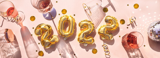 Gold balloons 2022, champagne glasses Cconcept fun New Years party