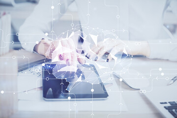 Double exposure of brain sketch hologram and woman holding and using a mobile device.