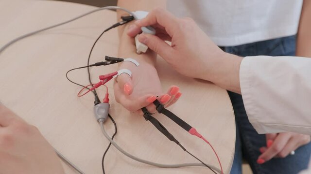 Patient nerves testing using electromyography at medical center