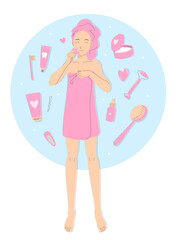 Young girl in a towel after shower. Cute girl with towel on her head making skin care procedures with face stone massager quartz scraper. Beautiful woman surrounded by different cosmetic products.
