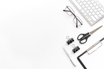 Office desk table mock up with computer keyboard and notepad
