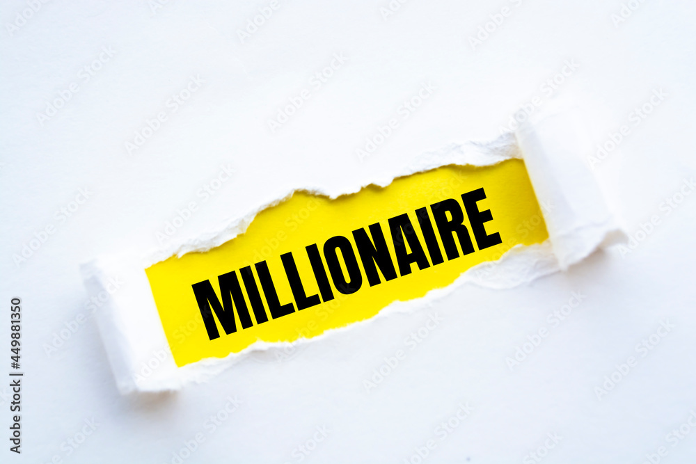 Wall mural millionaire with white paper tears on yellow texture