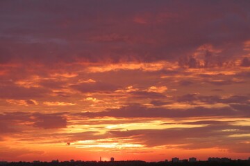 Beautiful fiery orange sunset in the sky, natural background