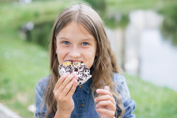 girl eating donut. Fashion girl with beautiful hairstyle. Pretty young woman. Fashion illustration.