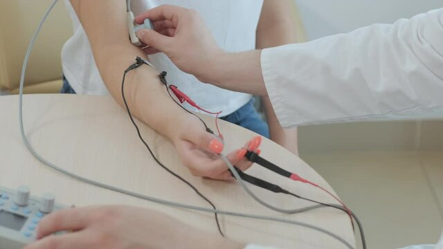 Patient nerves testing using electromyography at medical center