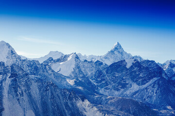 Fototapeta na wymiar beautiful view of mount Ama Dablam with beautiful sky on the way to Everest base camp, Khumbu valley, Sagarmatha national park, Everest area, Nepal