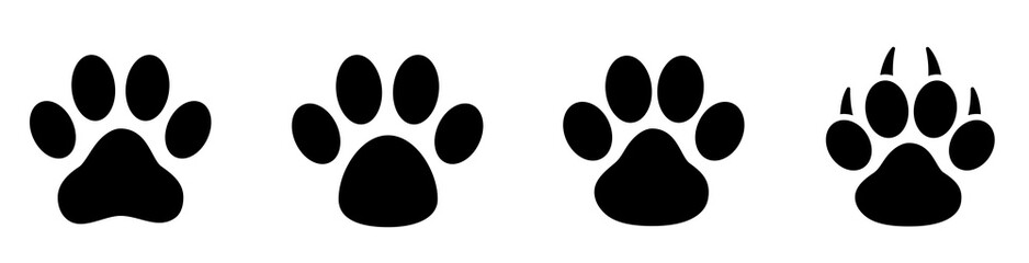 Paw print set. Paw foot trail print of animal. Dog, cat, bear, puppy silhouette. Collection of paw prints. Different animal paw - stock vector. © Comauthor