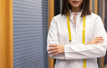 dietitian woman with tape measure and apron
