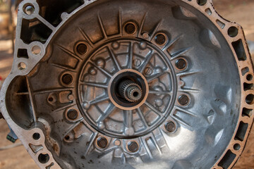 Interior image of a car gear, car parts being dismantled.