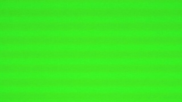 Green screen with VHS stripes. Jitter, defects, noise and artifacts on the old TV screen. Analog Abstract Digital Animation. VHS tape.