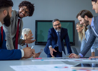 Collaboration and analysis by business people working in office