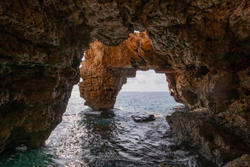 Mediterranean arc rock formations in the spanish coast, Cala Moraig, cova dels arcs