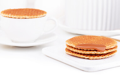 cup of coffee and stroop waffles