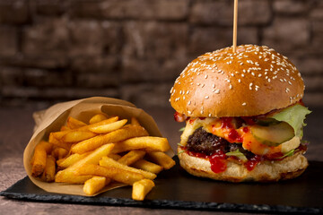 Burger with meat and french fries