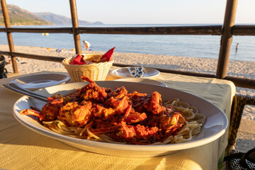 an exquisite lobster served on a Sardinian beach