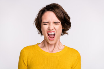 Photo of aggressive girl close eyes scream open mouth wear yellow shirt isolated grey color background