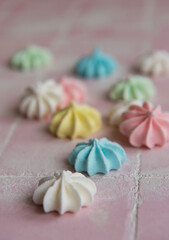 Fototapeta na wymiar Small colorful meringues
