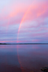 Fototapeta na wymiar Autumn sunset and rainbow in Lapland, Finland