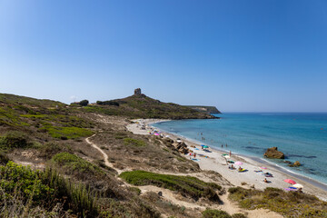 San Giovanni in Sinis beach with San Giovanni coastal tower in the background. Sinis Peninsula and its marine protected area  Cabras, Oristano, Sardinia, Italy