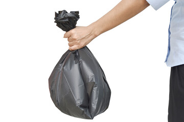 Hand holding a black garbage bag on grey background.
