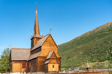 Fototapeta na wymiar Medival wooden Lom Stave Church Lom stavkyrkje from twelve century. Fossbergom, Lom, Norway.