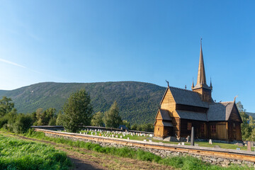 Fototapeta na wymiar Medival wooden Lom Stave Church Lom stavkyrkje from twelve century. Fossbergom, Lom, Norway.