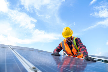Engineer working on checking equipment in solar power plant,solar power plant to innovation of...